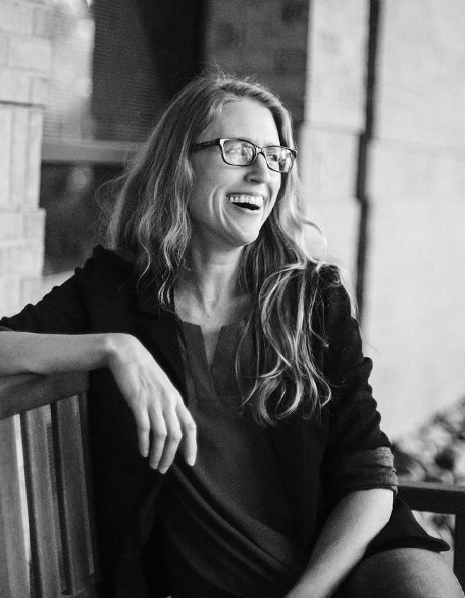 Laughing woman on bench